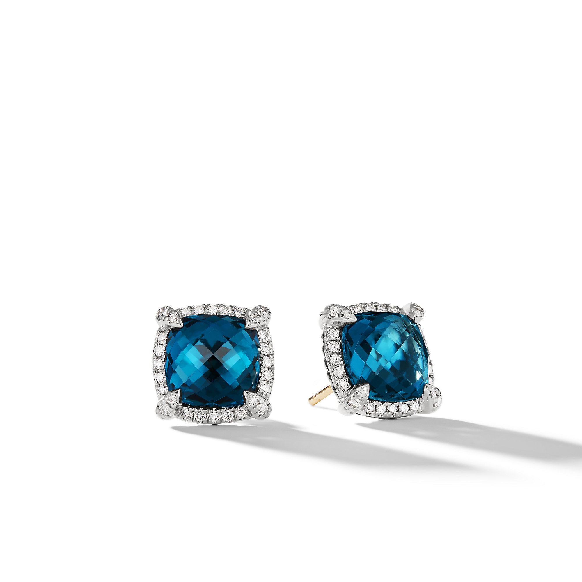 Lot - David Yurman sterling silver vintage blue topaz infinity earrings  with cable design, 7mm stone.