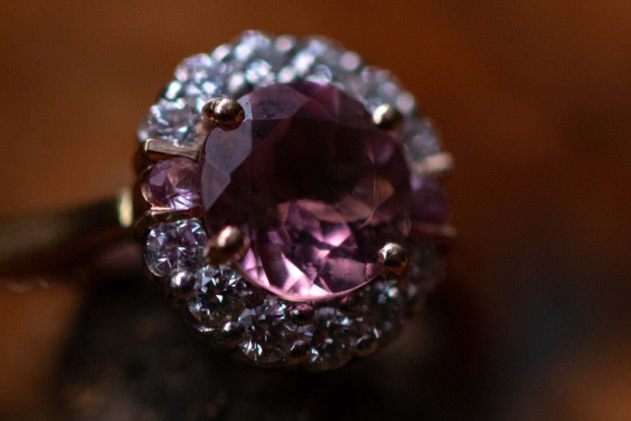 Amethyst fashion ring with gemstone halo