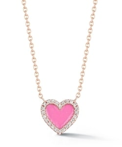 A pink heart pendant features a rose gold chain