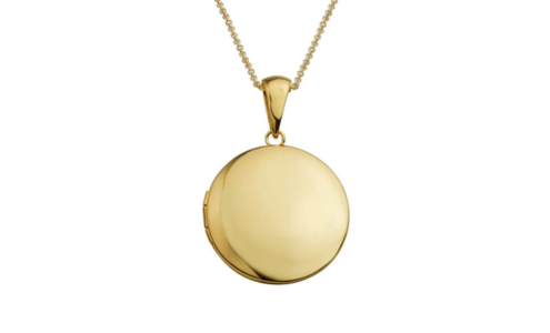 A simple yet elegant yellow gold locket, available at Aucoin Hart Jewelers.