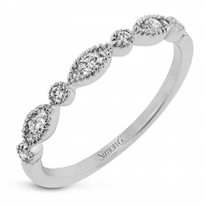 a vintage stacking ring from Simon G. with diamond accents.