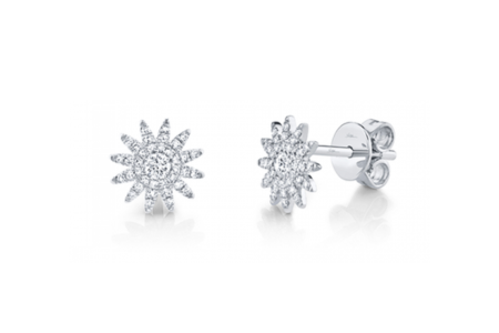 A close-up of a pair of Shy Creation diamond earrings, available at Aucoin Hart Jewelers.