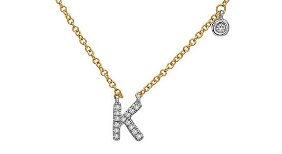 a mixed metal chain necklace with a “K” initial pendant