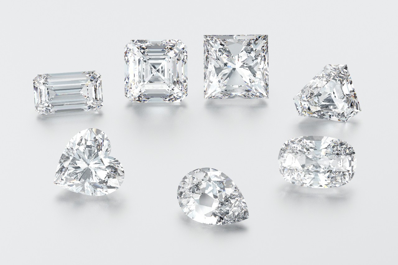 A close-up of multiple diamond shapes displayed on a white background.