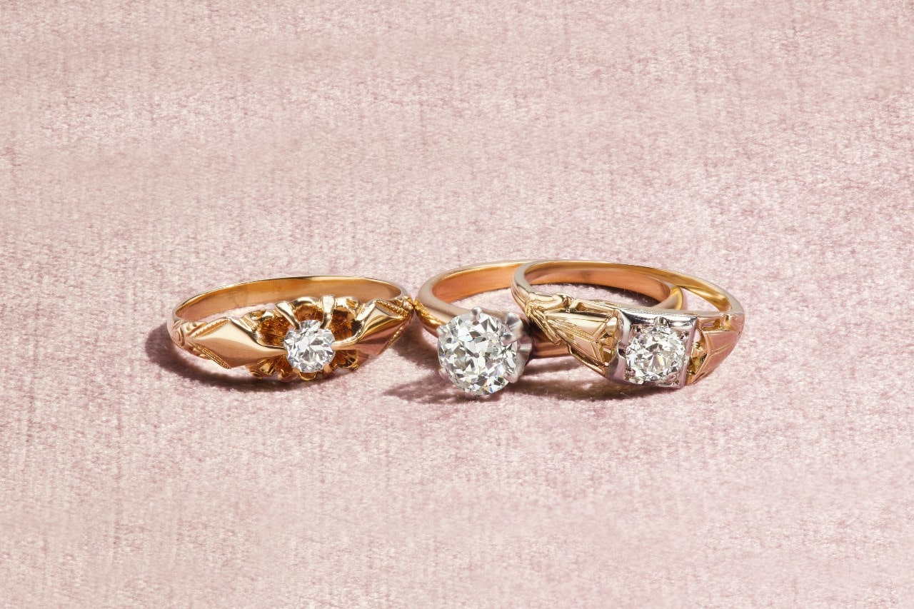 Three yellow gold and diamond engagement rings