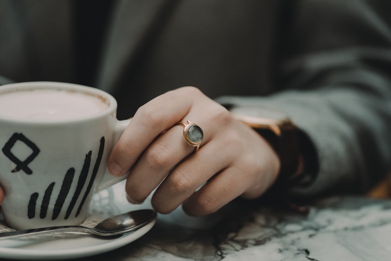 A smoky topaz bezel set in rose gold for a non-traditional engagement ring